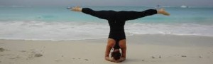 headstand on the beach